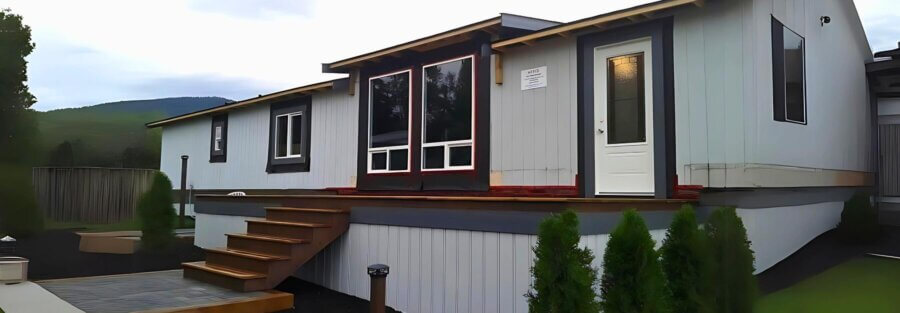 a house with stairs and mobile home windows